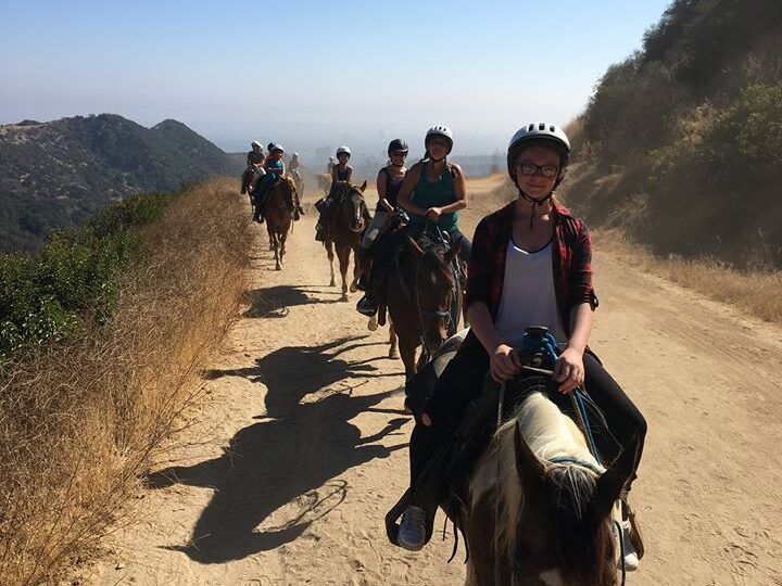 Horseback riders on a trail in Griffith Park